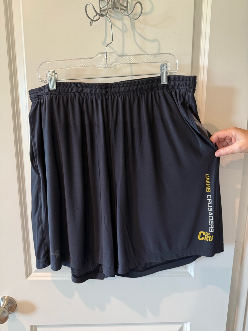 Under Armour Men's Black Athletic Shorts with Yellow Logo Accent